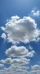 Obraz premium Blue Sky Dreams: Majestic Cumulus Clouds Floating in Azure Skies - A Perfect Day for Cloud Watching!