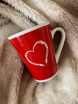 coffee cup with a red heart
