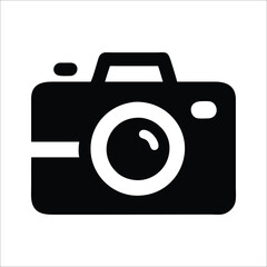 Modern DSLR Camera with Professional Lens on Wooden Table  
