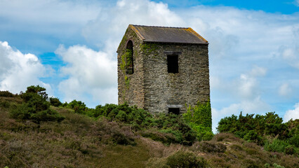 Fototapeta premium Derelict industrial building on moorland 