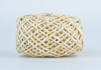 decorative rope ball on a plain background