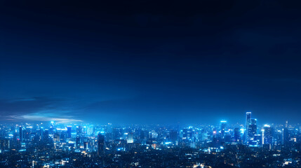 Obraz premium Night Cityscape An aerial view of a vibrant city illuminated at night, ideal for urban planning, technology, and travel advertising