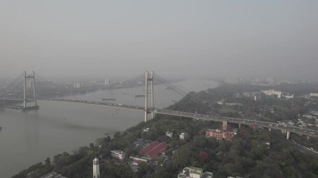 Kolkata Victoria Memorial Vidyasagar Setu Eden Garden Maidan 42 Biswa Bangla New Town Sector 5 Salt Lake view drone footage aerial view. Indian roads and landmarks of subcontinent empty roads.