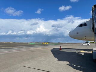 Fototapeta premium South Korea, Jeju Island, Jeju Airport, before boarding, runway, clear sky