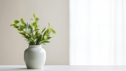 Fototapeta premium Elegant White Vase with Green Leaves in Minimalist Interior Setting, Soft Light and Subtle Background for Modern Home Decor Inspiration