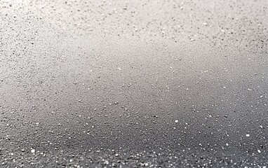 Detailed view of water droplets on a fogged glass surface with shiny texture and reflection effects