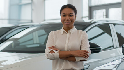 Portrait of African American woman girl customer business client buyer in modern luxurious auto...
