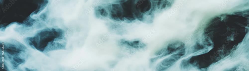 Poster Softly blurred clouds create an ethereal background with gentle gray and white tones