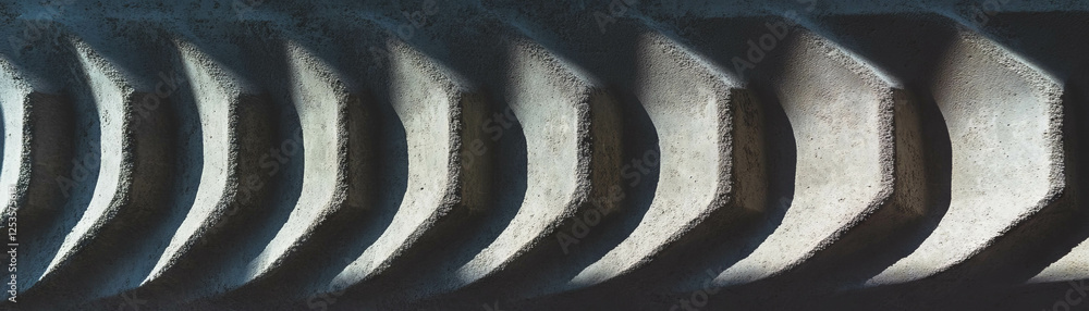 Poster engraved concrete with intricate designs and bright background for artistic effect