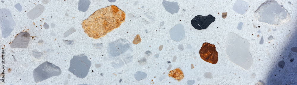 Poster exposed aggregate cement showcasing diverse pebbles and textures on a bright background
