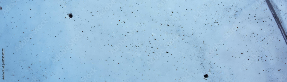 Aufkleber poured cement with a smooth and glossy surface featuring subtle imperfections and bright background