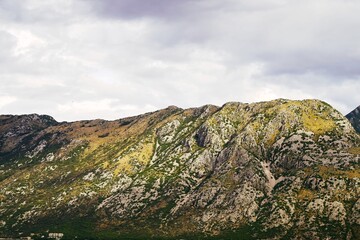 Mountain landscape with lake and cloudy sky