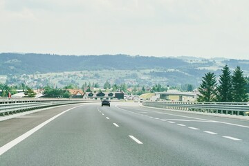 Fototapeta premium Scenic highway drive through rural landscape