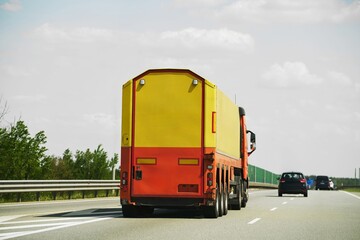 Semi truck driving on highway road