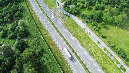 Highway Traffic Next to Noise Wall