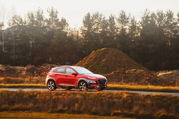 Automobile cruising through countryside