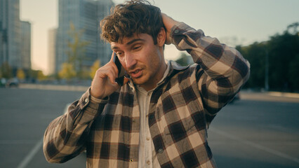 Confused anxious man rich businessman guy male driver broke car on road talk mobile phone call service tow truck assistance vehicle breaking problem with automobile transport insurance auto in city