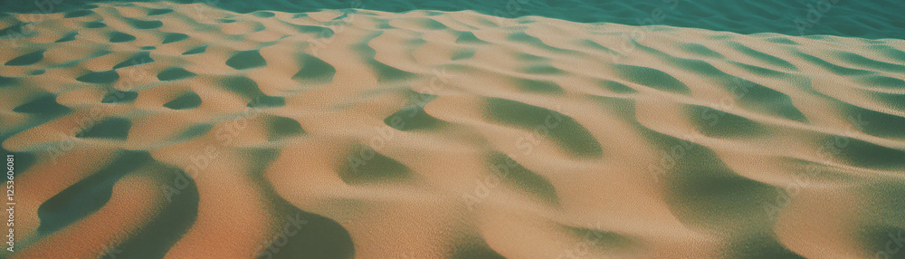 Poster close-up view of textured sand dunes showcasing depth through halftone details
