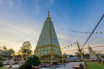 Background of beautiful religious tourist attractions, the ancient church Wat Phra That Nong Bua has a Naga statue, a replica pagoda with a long history, tourists always come to see the beauty in Ubon