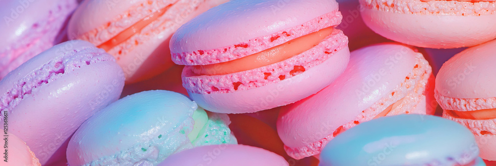 Poster colorful macaroons beautifully arranged in an artistic pattern for a delightful display
