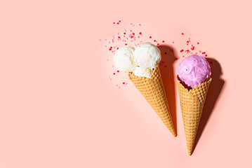 Two ice cream cones with heart sugar sprinkles