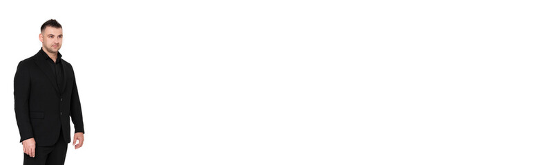 A handsome dark-haired man wearing a business suit, a black shirt on a white background