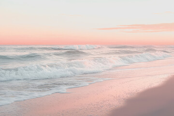 Person walking on sandy beach carrying surfboard during sunny day with ocean waves in background