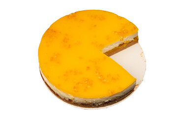 Orange cheesecake isolated on a white background.