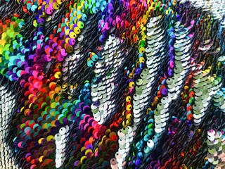 Rainbow sequins fabric shining with iridescent colors