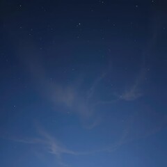 Softly lit sky with wispy clouds and a few stars, dark, night, stars