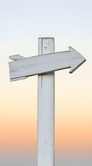 Rustic White Wooden Arrow Signpost at Sunset