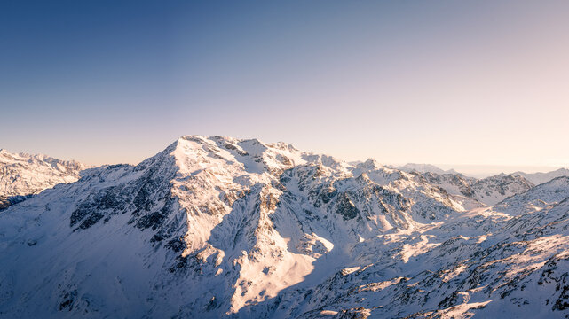 Majestic Alpine Peak Under Winter Sun (Bormio, Italy)