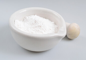 Tricalcium phosphate, sometimes abbreviated TCP, more commonly known as Calcium phosphate.