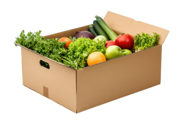 Cardboard box with food vegetables and fruits in a cardboard box food delivery and food bank concept