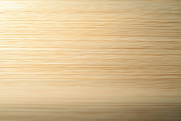 Smooth wooden texture, light golden hue, horizontal grain pattern, warm tones, soft lighting, close-up view, minimalist background, natural wood surface, subtle variations in color, clean and simple 