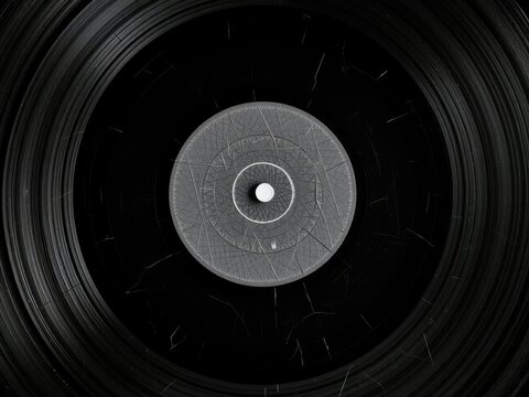 A close-up of a scratched vinyl record isolated on black, vinyl record scratch isolated, phonographic fault