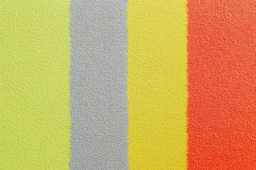Fototapeta premium Colorful vertical stripes, textured surface, pastel green, light gray, bright yellow, vibrant orange, abstract composition, minimalist design, color block pattern, geometric art, painted wall texture