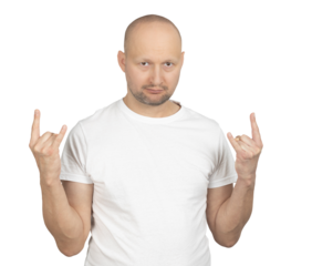 Man in a white t-shirt making a rock hand gesture with a serious look
