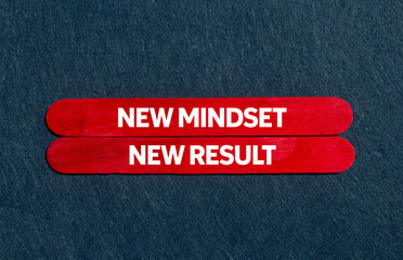 New mindset new result message written on red wooden sticks on gray background. Conceptual new mindset new result symbol. Copy space.