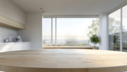 round wooden table in bright, modern kitchen with large windows and blurred background. space is filled with natural light, creating serene and inviting atmosphere