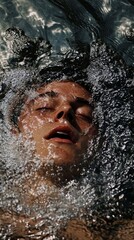 Fototapeta premium Man submerged in water capturing a moment of tranquility and reflection during a serene swim