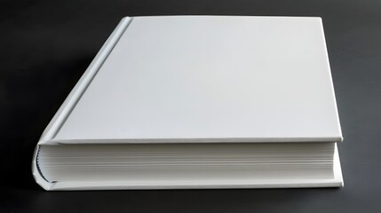 Closed Plain White Book in Letter Format on Black Background