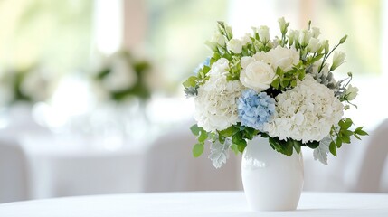 White and blue flowers in vase on a table, wedding reception background