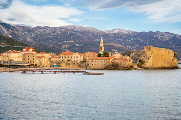 Fototapeta premium Budva, Montenegro, Balkans, Europe. Old town and mountains in background in winter time