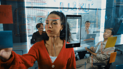 Portrait of hispanic businesswoman present start up marketing idea to investor. Female leader...