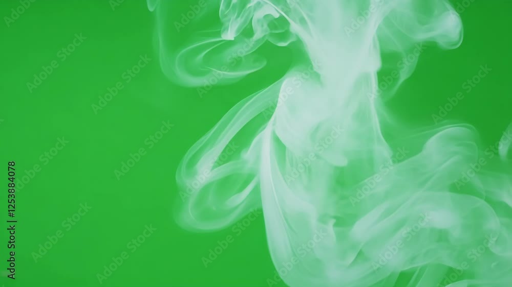Poster evolving patterns of vapor swirl playfully evoking a sense of motion. green screen chromakey