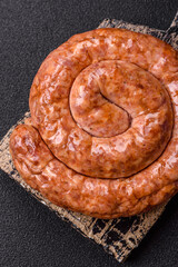 Delicious homemade sausage in the shape of a snail or spiral