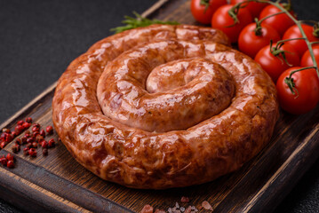 Fototapeta premium Delicious homemade sausage in the shape of a snail or spiral