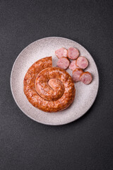 Delicious homemade sausage in the shape of a snail or spiral