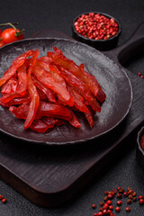 Dried chicken slices, jerky, with cherry or plum flavor, salt and spices